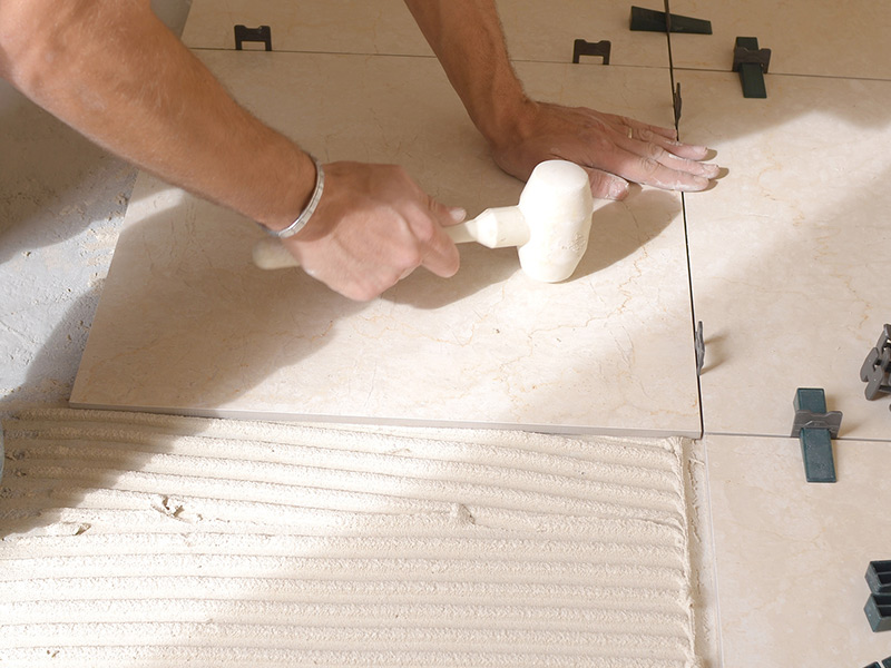 Timber and tiles in kitchen and bathroom flooring